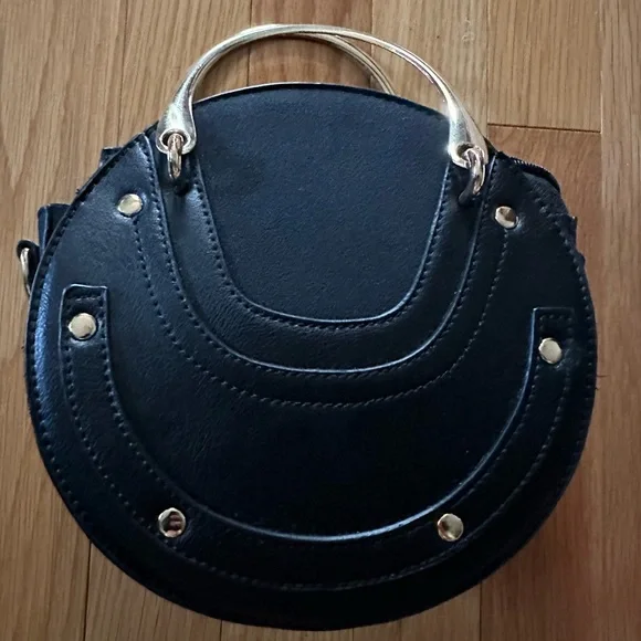 Cute pixie bag w/faux leather & suede w/gold tone studs, handles, & long strap - Picture 1 of 9